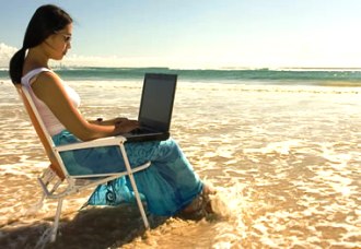 Female student using a laptop to access remote labs